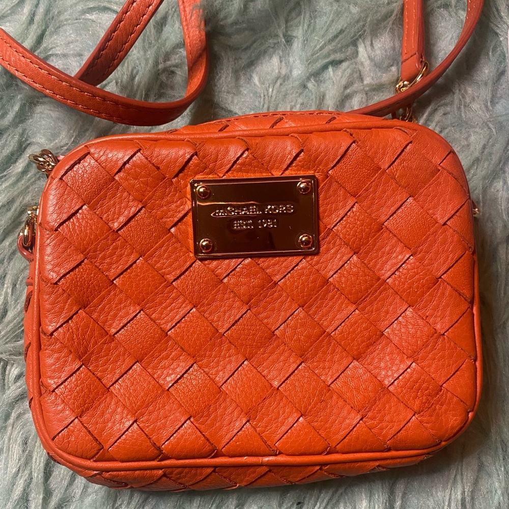 MICHAEL Michael Kors
Jet Set Mini Orange Woven Leather Cross Body Bag